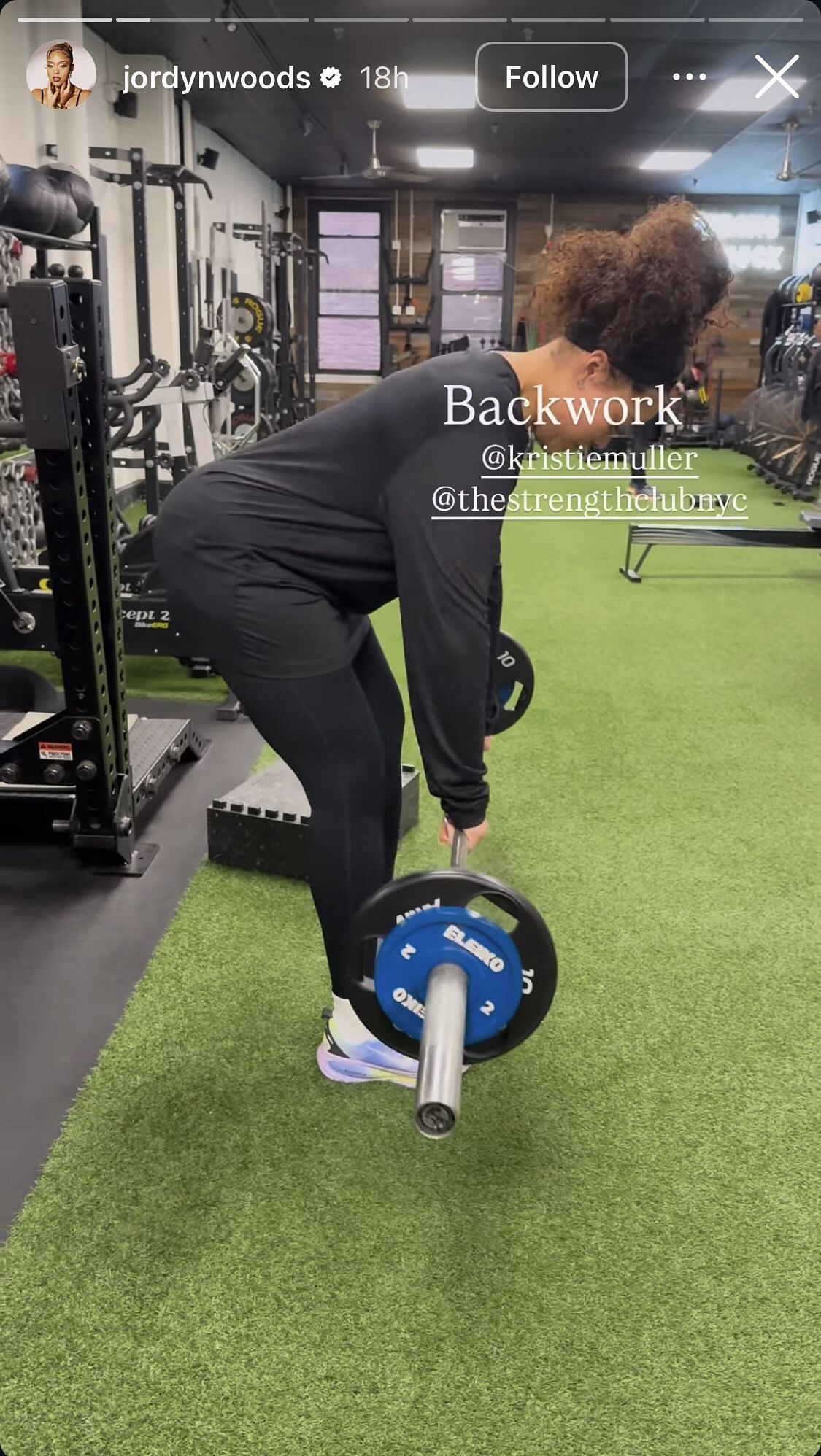 Jordyn Woods performed back work with a barbell/ Instagram @jordynwoods